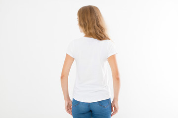 back view of young caucasian, europian woman, girl in blank white t-shirt. t shirt design and people concept. Shirts front view isolated on white background. Mock up. Copy space.