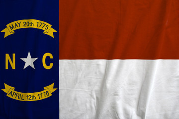 Flag of North Carolina, USA waving.