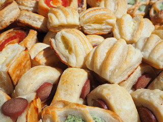 Mix of delicious appetizers and small pizzas made of puff pastry