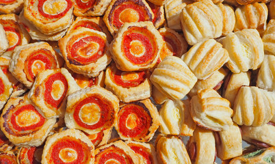 Mix of delicious appetizers and small pizzas made of puff pastry