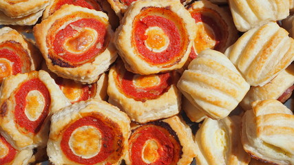 Mix of delicious appetizers and small pizzas made of puff pastry