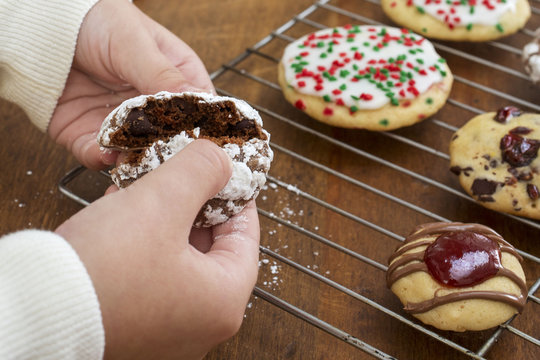 Holiday Cookie with Child's Hand