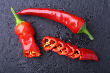 CloseUp top view red chili pepper with sliced, raw food ingredient concept