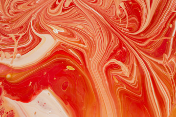 Mixing acrylic paint in different colors. Marbleized.