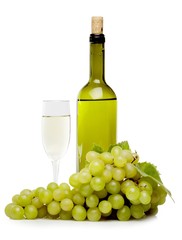 Fototapeta na wymiar White Grapes with the Wine Bottle and the Wine Glass