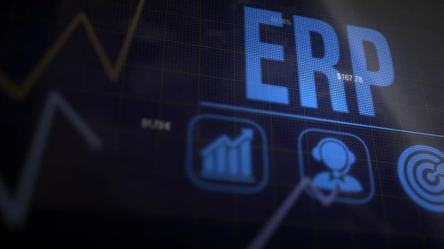 A ERP business concept on a flashing computer monitor with moving graphs and data.