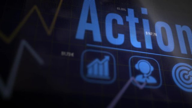 A Action business concept on a flashing computer monitor with moving graphs and data.