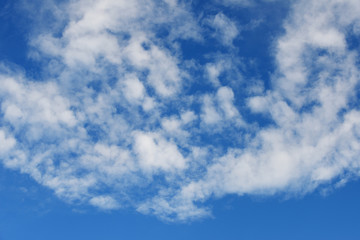 White clouds on the blue sky background