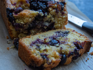 Closeup Single slice of Blueberry Loaf Cake with Knife