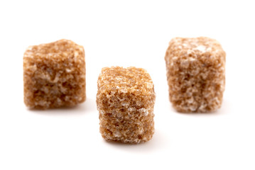 Brown Sugar Cubes on a White Background