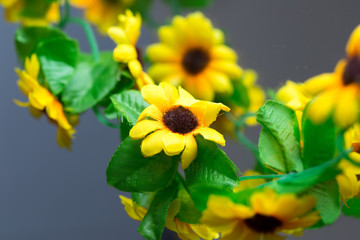 Naklejka premium artificial yellow flower for interior