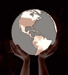 Jamaica on globe in hands