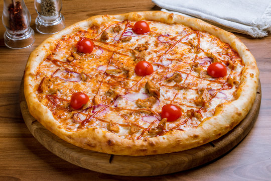 Pizza with meat and barbecue sauce