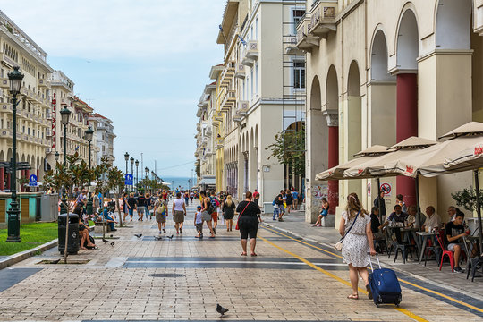 Thessaloniki, Greece - August 16, 2018: Aristotelous Square, Thessaloniki, Greece. Beautiful view of the old houses of Thessaloniki, people are walking.