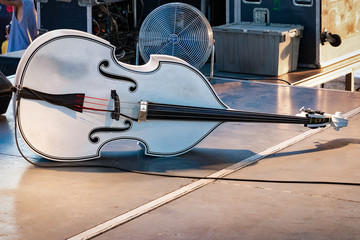 Standup bass laying on stage