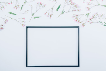 Black blank frame in the center of the floral festive border