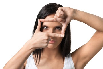 young woman finger framing