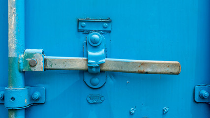 Close up Door Lock container. Blue cargo container