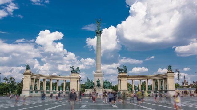 Heroes' Square (Hős&ouml;k tere with Millenniumi eml&eacute;kmű) in Budapest with a crowd of people at summer day. Time lapse