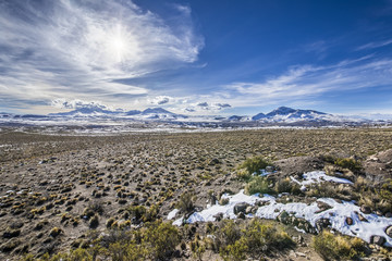 The Caves area with amazing altiplano landscape at Lauca National Park in the Atacama Desert an amazing view over the altiplano a typical landscape from the north of Chile, mountains and meadows