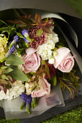 Flower bouquet with black wrapping paper 