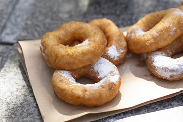Doughnuts with sugar powder and coffee. Street food