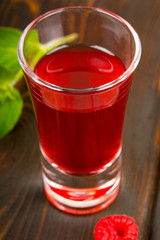 fresh homemade raspberry juice in high glass