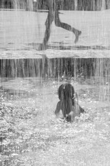 Children bathe in a fountain in a new park in South Butovo. Moscow. Russia