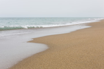 Fototapeta na wymiar Beautiful beach view with soft sand and blue sea