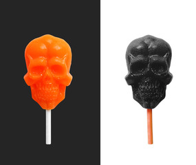 candy in shape of  skull  on white and black background