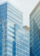 Obraz premium Business buildings with reflection on glass