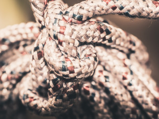 Close-up End of vintage rope on sunlight background.The concept of team works.