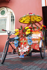 Malaysian tricycle In the street of melaka 