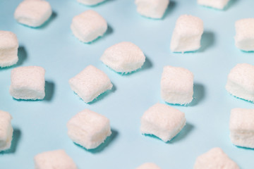 White Marshmallow on the blue background
