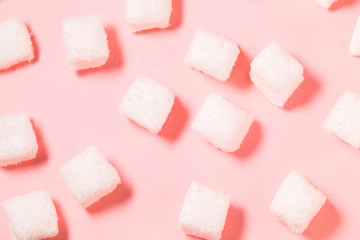 White marshmallow on pink background
