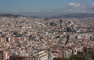 Fototapeta premium View of city of Barcelona with unfinished Sagrada Familia from Montjuic Castle viewpoint