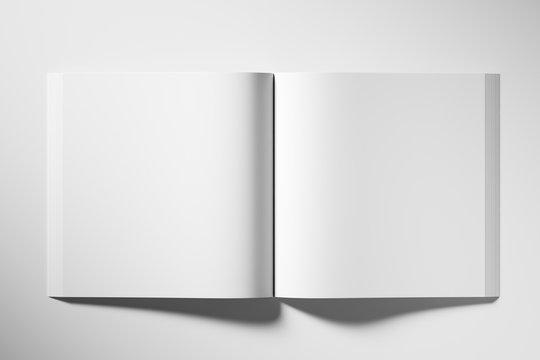 Empty white book in unfolded on a light background. Top view. Mock up. 3d rendering