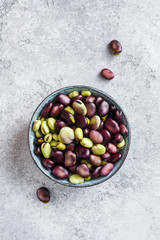 Raw organic broad beans in bowl. Healthy food