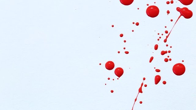 Red lacquer pours on white background