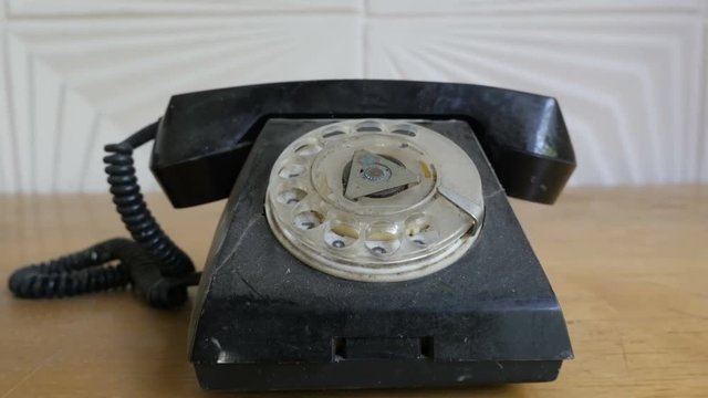 The old black telephone from 1970s 1980s
