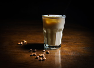 Coffee drinks on a black background. Coffee on a black table. Cold coffee. Latte. Cappuccino. Espresso. Coffee cocktails. Milkshakes. Whipped cream. Barista