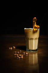 Coffee drinks on a black background. Coffee on a black table. Cold coffee. Latte. Cappuccino....