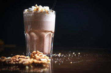 Coffee drinks on a black background. Coffee on a black table. Cold coffee. Latte. Cappuccino. Espresso. Coffee cocktails. Milkshakes. Whipped cream. Barista
