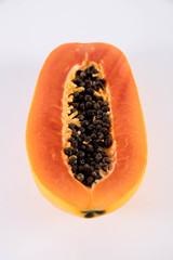 Papaya cooked in half.