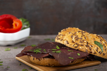 Open sandwich with beef pastrami