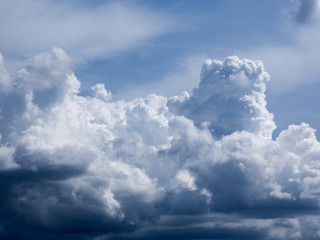 Clouds are a large group of blue, white, and blue sky.