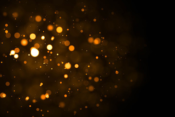 Gold abstract bokeh background. real backlit dust particles with real lens flare. glitter lights . Abstract Festivevintage.