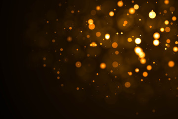 Gold abstract bokeh background. real backlit dust particles with real lens flare. glitter lights . Abstract Festivevintage.