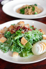 Caesar salad plate with cheese and croutons