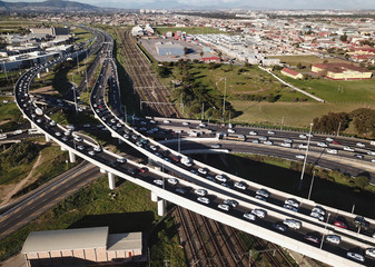 Obraz premium Aerial view over busy interchange at rush hour